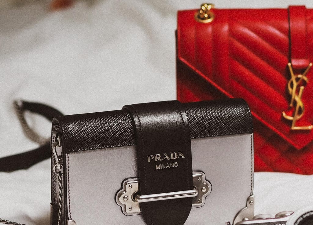 due borse di lusso di Prada e YSL